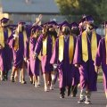 Grads make their way to Tiger Stadium.